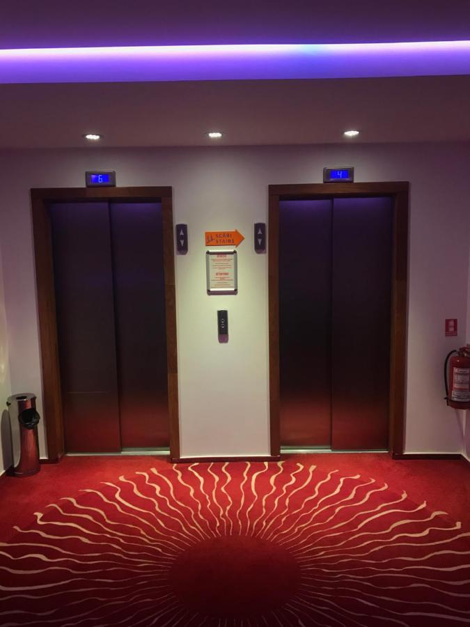 Marshal Garden Hotel Bucharest Exterior photo Elevators in a hotel