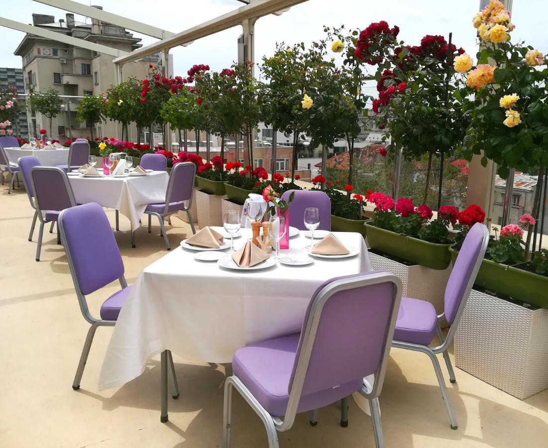 Marshal Garden Hotel Bucharest Exterior photo The rooftop restaurant